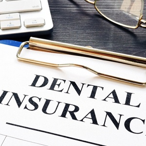 Closeup of dental insurance paperwork on table