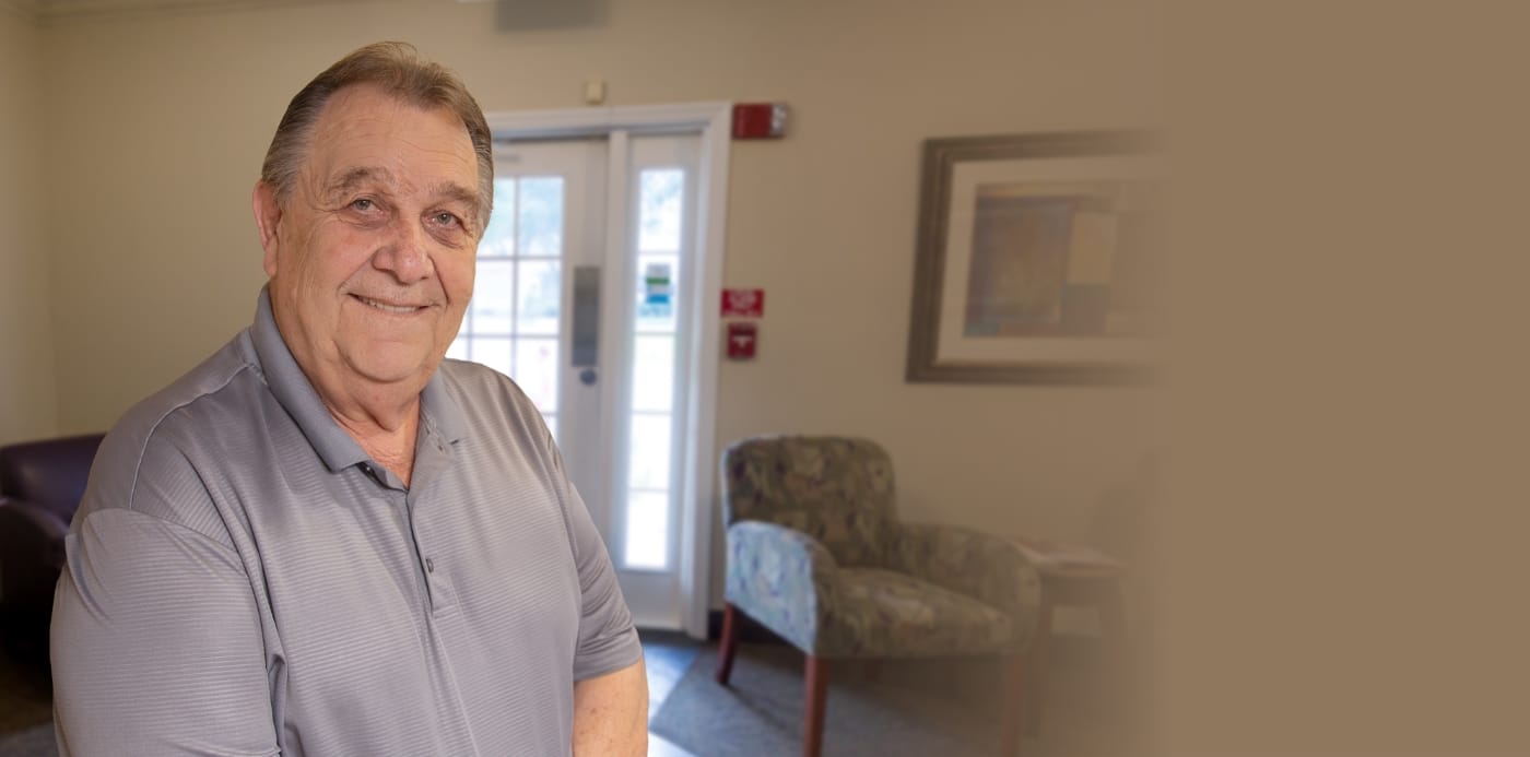 Dental patient Michael A smiling after receiving dentures