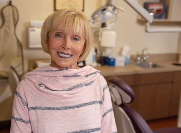 Dental patient with new denture smiling