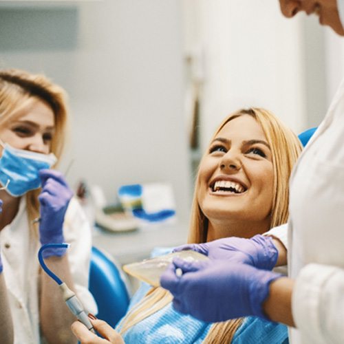 patient smiling during checkup 