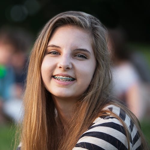 Smiling teen girl with braces