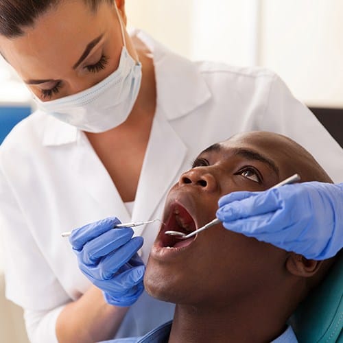 Patient receiving preventive dental checkup