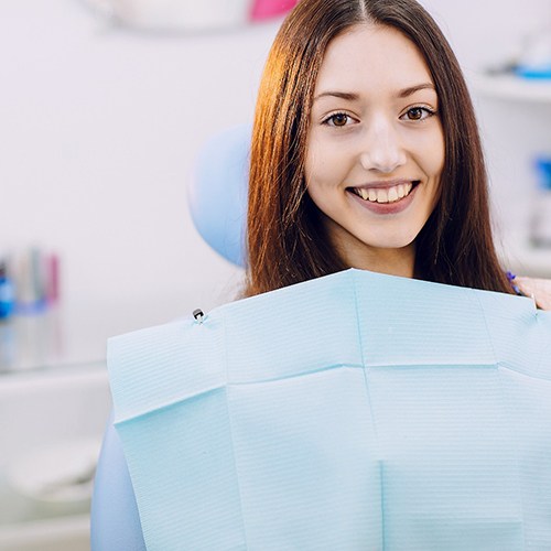 Female patient visiting dentist for full mouth reconstruction in Fort Myers, FL