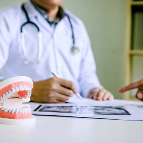 Patient smiling at denture dentist in Fort Myers