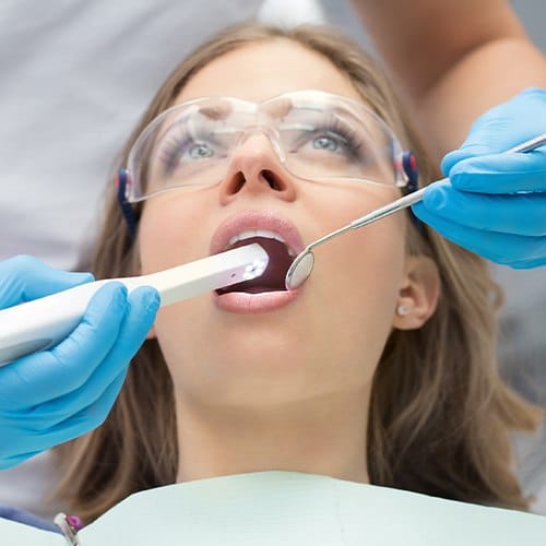 Dentist capturing intraoral images