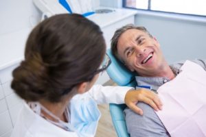 a patient visiting their dentist for a consultation